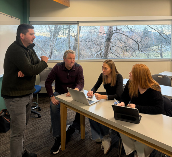 Gonzaga University student Madison Rose mentoring a middle school student